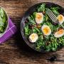 Spinach and egg salad in a bowl